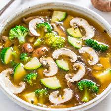 MUSHROOM SOUP SERVED WITH SPRING ROLLS