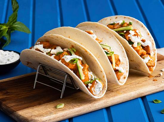 CHICKEN OR BEEF TACOS SERVED WITH FRESH JUICE