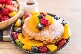 PANCAKE SERVED WITH MIX FRUIT/COFFEE